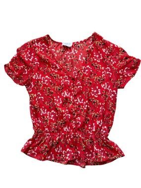 Sienna Sky Orange Floral Peplum V-Neck Blouse